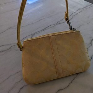 Yellow Coach Wristlet In Signature Canvas